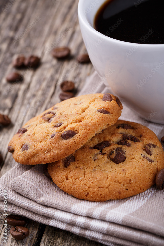 Tasty cookies and coffee cup on a wooden table. Tasty cookies and coffee cup on a wooden table.