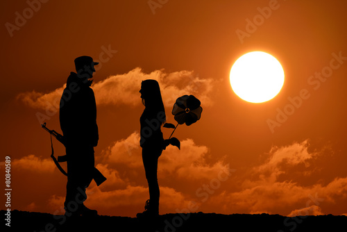 Silhouette of peace and love versus war and anger. No war