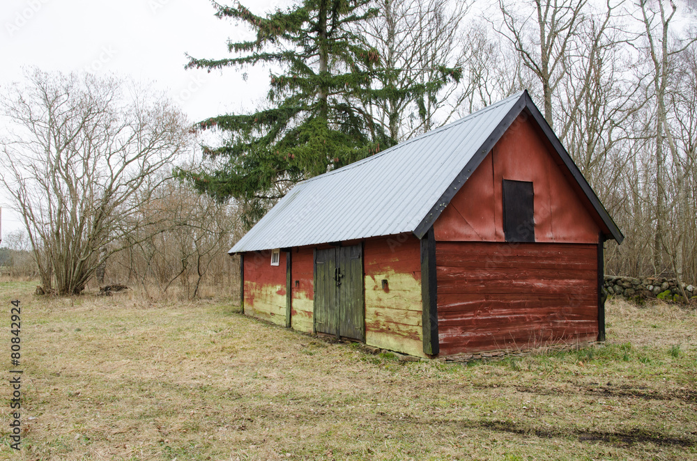 An old red outbuilding