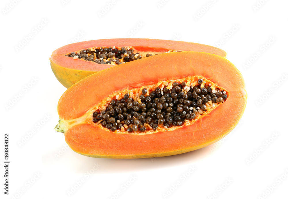 sweet papaya on the dish with green papaya leaf sweet papaya on the dish with green papaya leaf
