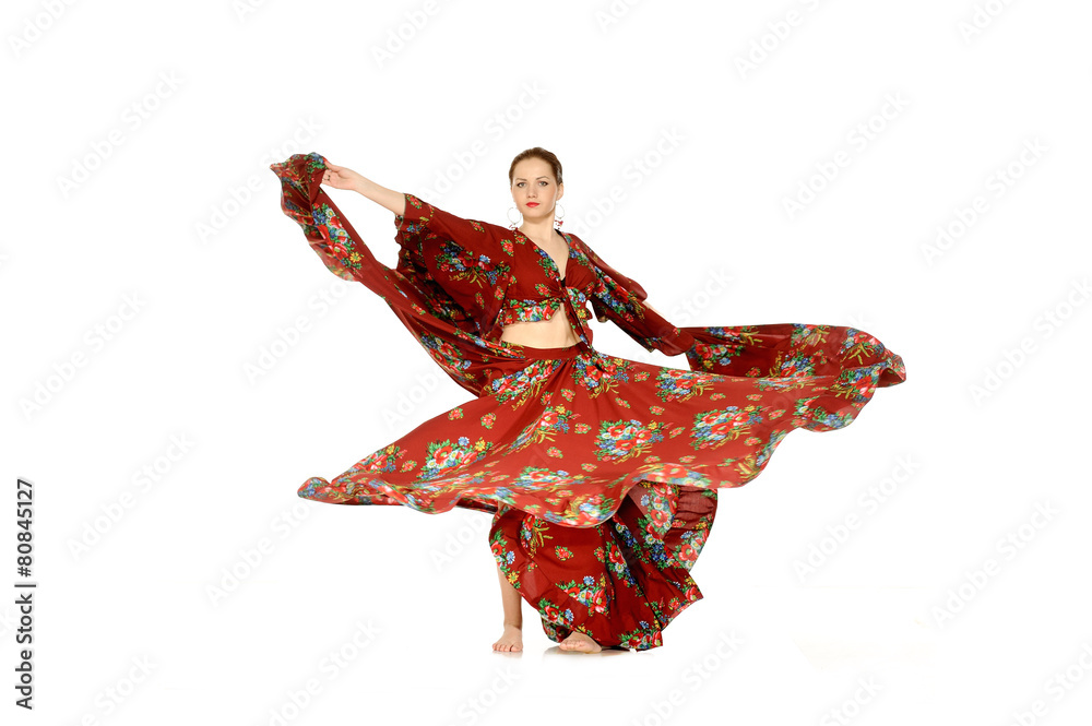Young beautiful woman dancing gypsy dance