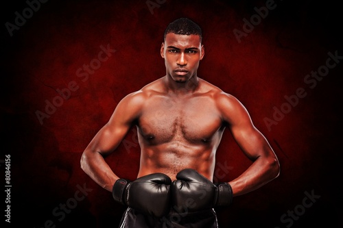 Composite image of muscular boxer