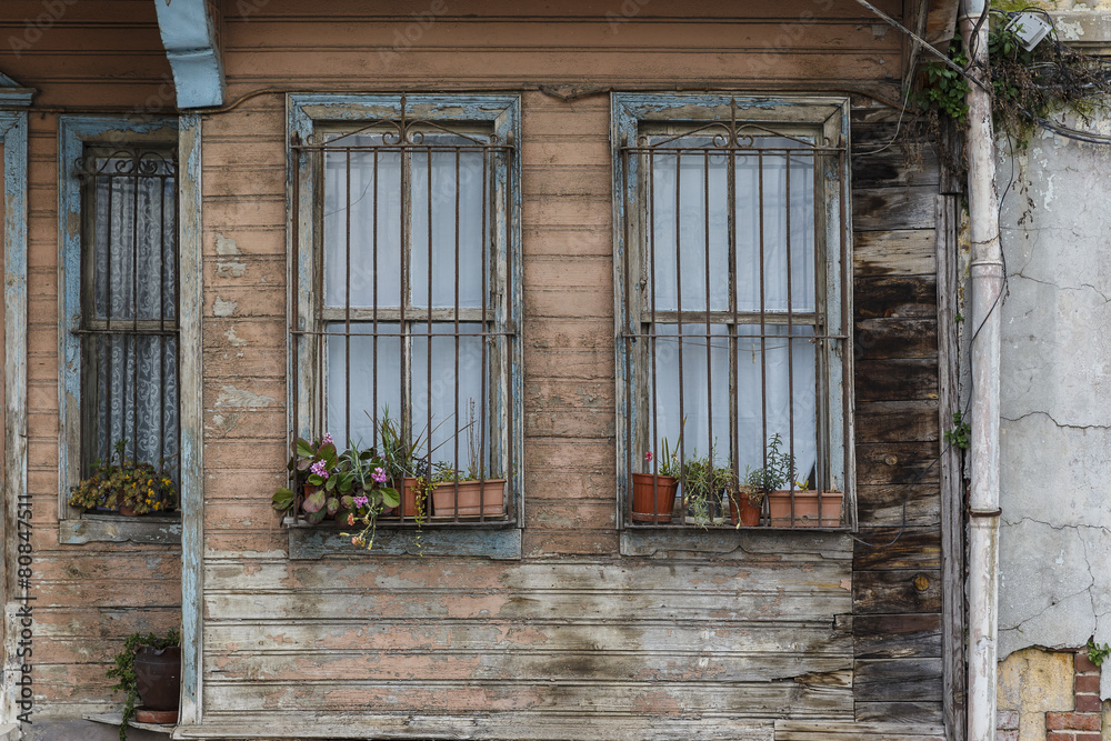 Old wooden house wall paneling and window Old wooden house wall paneling and window