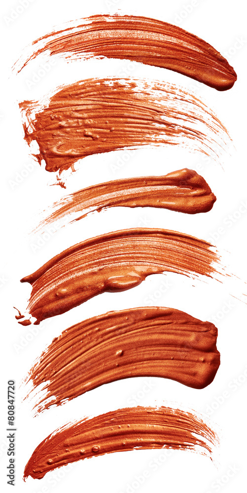 Fototapeta premium Strokes of bronze paint