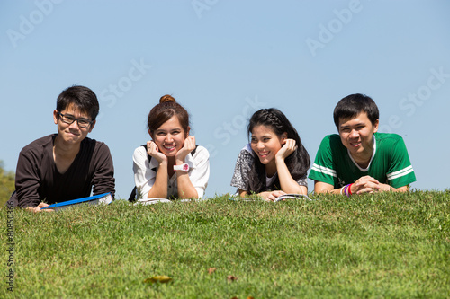 Asian student in park