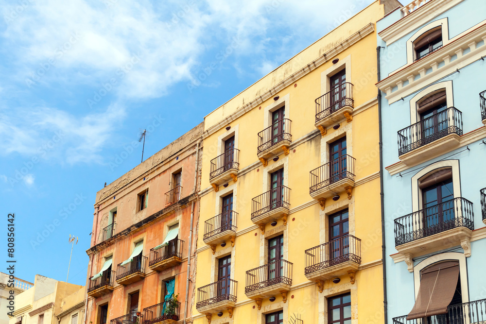 Colorful living houses facades. Street view of Tarragona