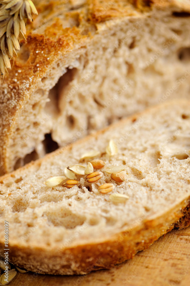 Close-up on traditional bread on wooden board Close-up on traditional bread on wooden board