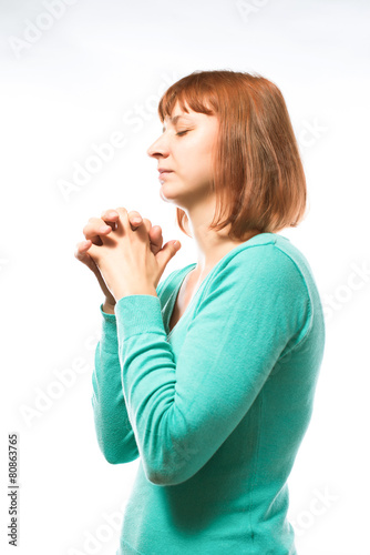 Redhead woman praying