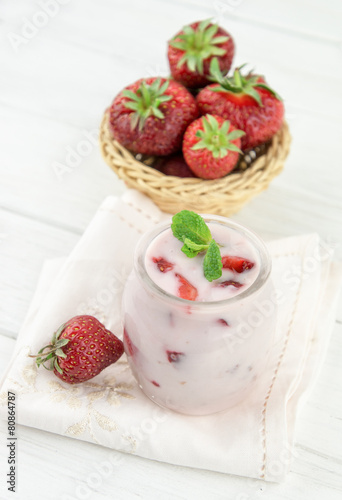 Strawberry yogurt  with fresh fruits and mint leaves