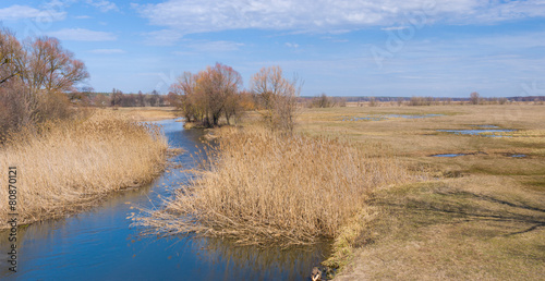 Spring landscape with small river Merla in Ukraine