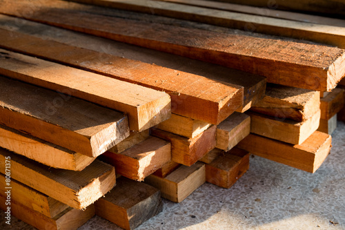 Obraz na płótnie Wood timber construction material, Stack of Building Lumber at C w salonie