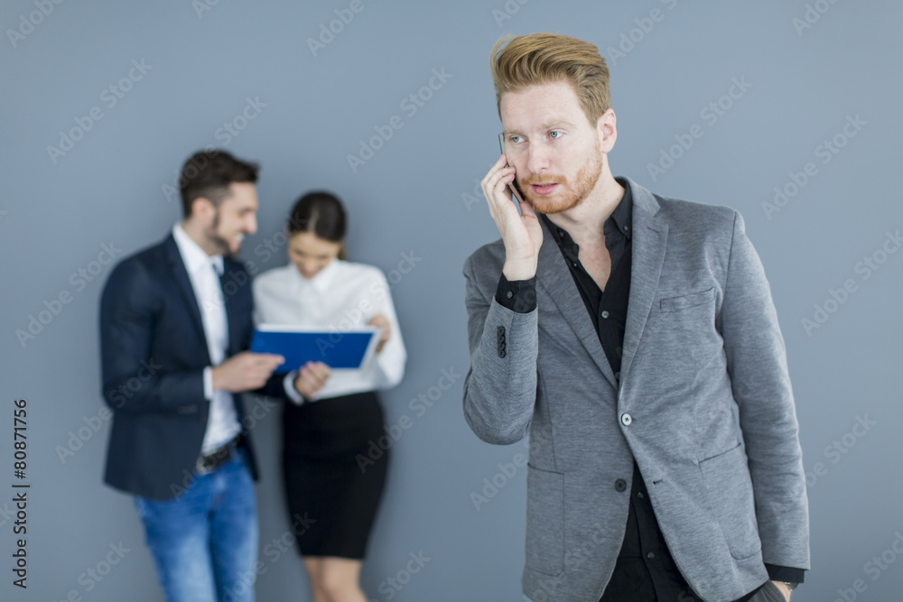 Young man with mobile phone Young man with mobile phone