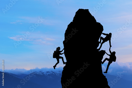 teamwork of two men travelers and girl help on mountain