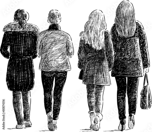 girls walks on city street