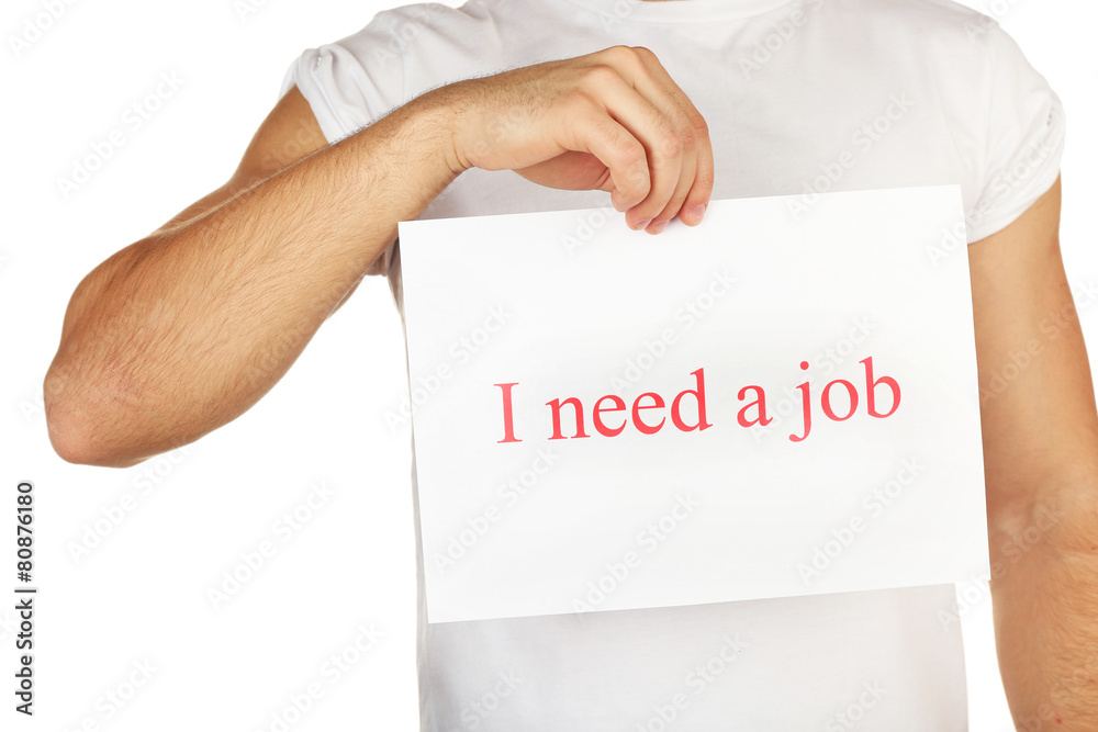 Sheet of paper with inscription I need a job in male hand isolated on white Sheet of paper with inscription I need a job in male hand isolated on white