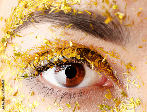 Female eye with fancy glitt...