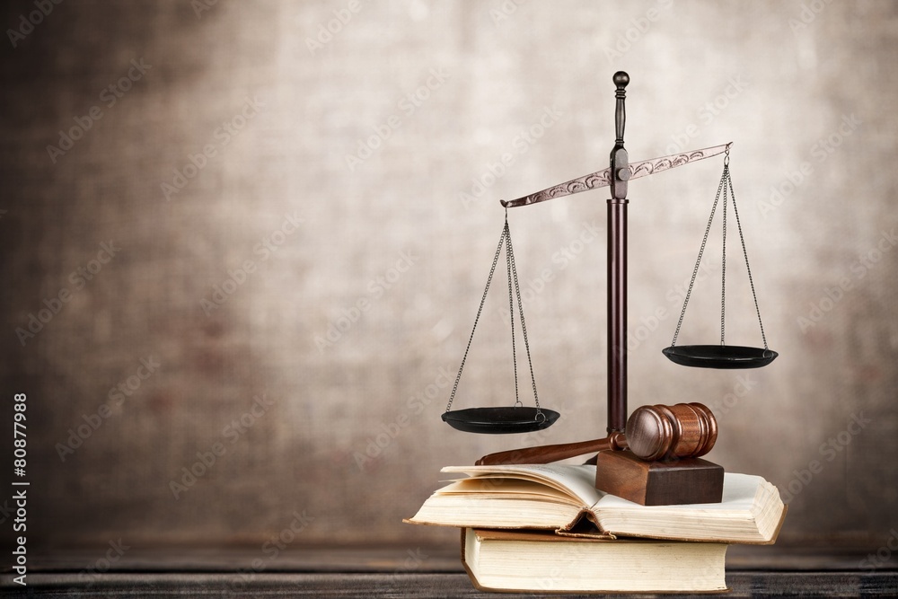 Law. Golden scales of justice, gavel and books isolated on white Law. Golden scales of justice, gavel and books isolated on white