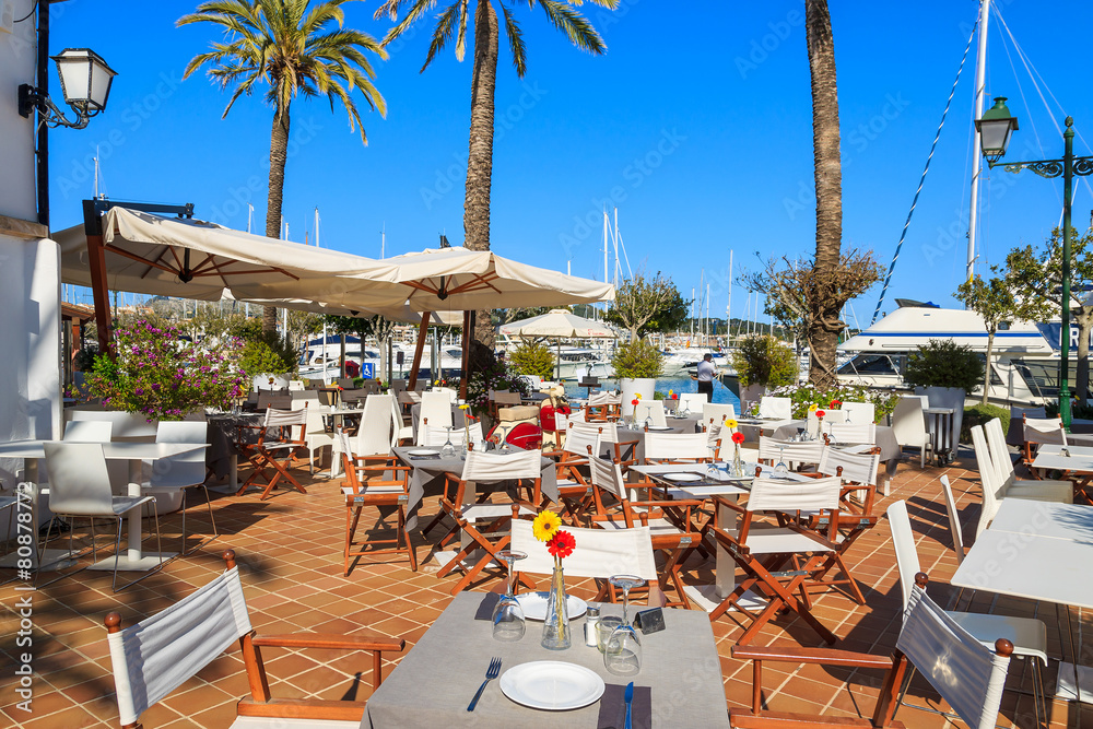 Restaurant tables in Alcudia town, Majorca island, Spain