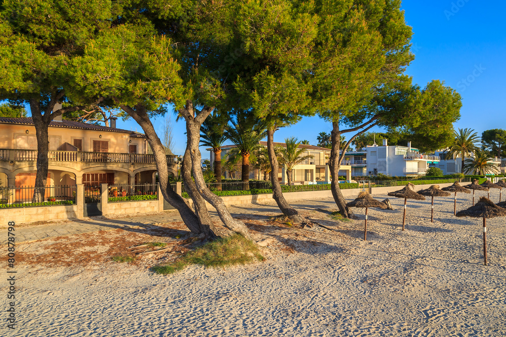 Holiday houses on beach in Alcudia town, Majorca island, Spain
