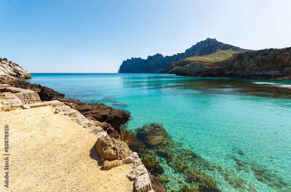 Turquoise water of Cala San Vicente beach, Majorca island, Spain