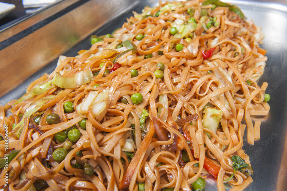 Vegetable chow mein meal at a buffet Vegetable chow mein meal at a buffet