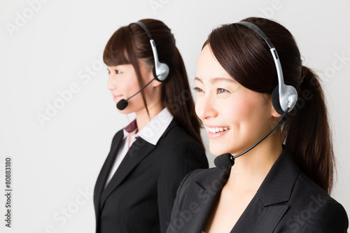 asian businesswomen using headset