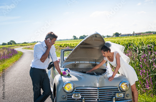 The newlyweds have a car breakdown.