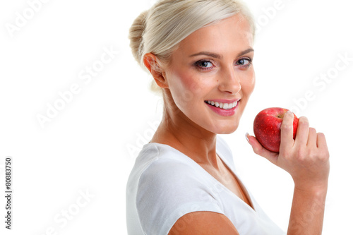 blonde woman with apple. Diet. Healthy lifestyle.