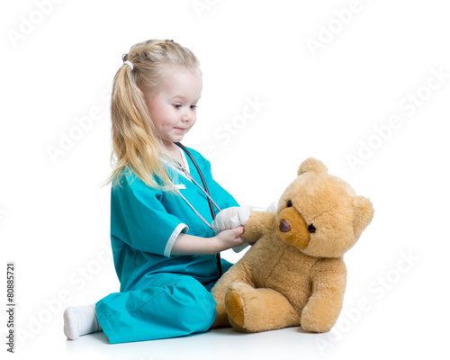 child girl playing doctor