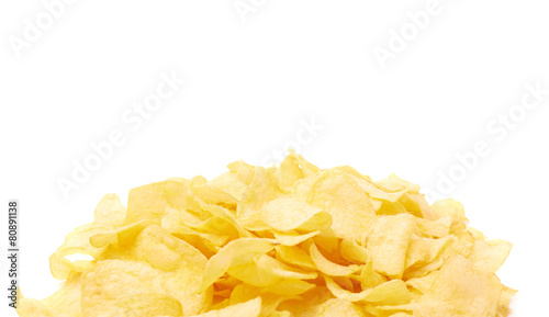Pile of multiple potato chips isolated