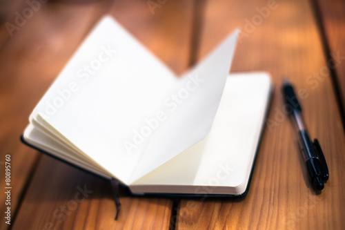 Notepad on a wooden table