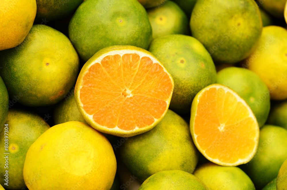 Green mandarin at fruit market Green mandarin at fruit market