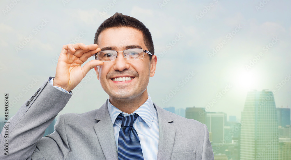 happy smiling businessman in eyeglasses and suit happy smiling businessman in eyeglasses and suit