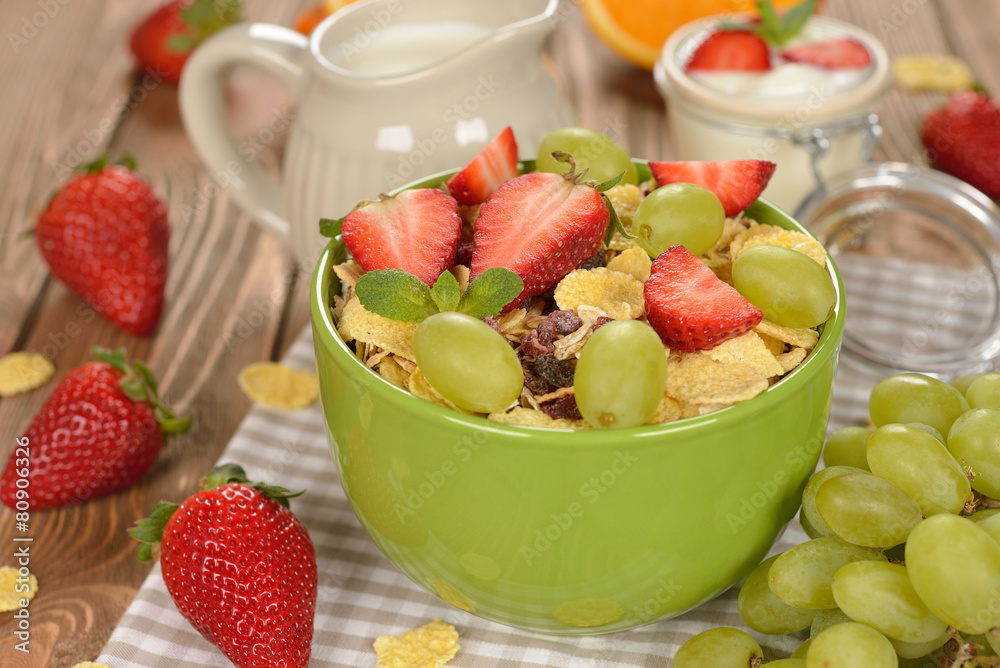 Natural muesli with strawberries and grapes Natural muesli with strawberries and grapes