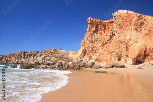 Sandy beach and blue sky in Algarve, Portugal