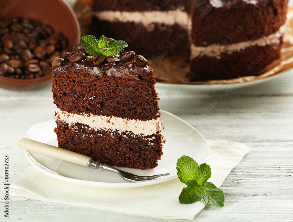Delicious chocolate cake on table close-up Delicious chocolate cake on table close-up