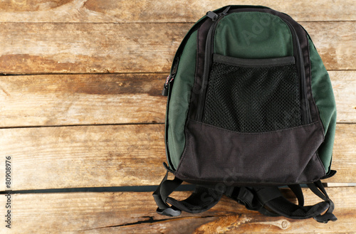 Canvastavla Backpack on wooden background
