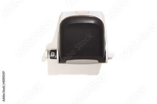 Hole puncher, black, top view, isolated on white