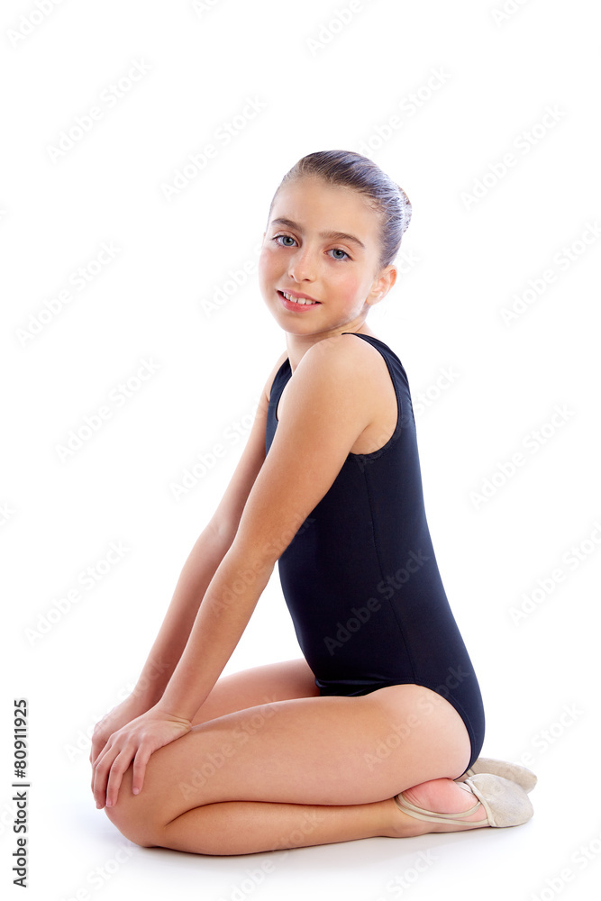 Kid girl rhythmic gymnastics exercises on white Kid girl rhythmic gymnastics exercises on white