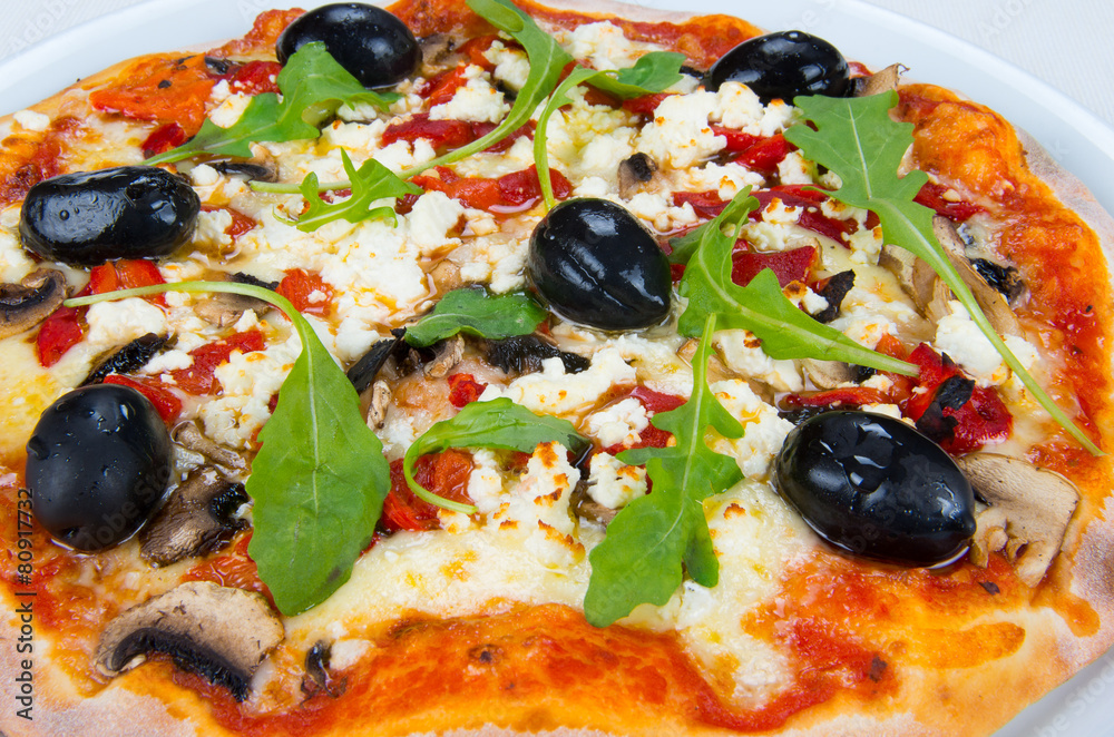 Pizza with cheese, mushrooms and olives. Pizza with cheese, mushrooms and olives.