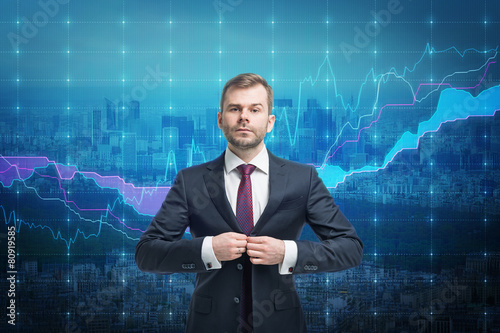Trader businessman stand over stock market screen