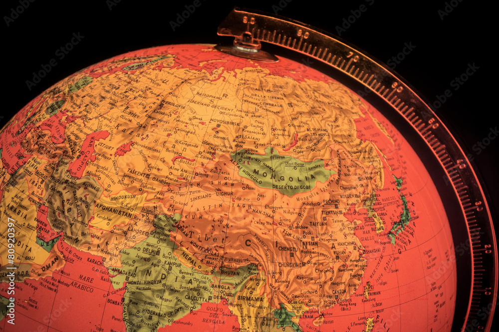 Fototapeta premium terrestrial globe on black background