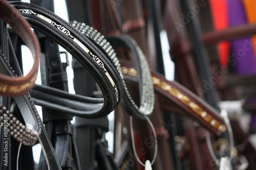 Close up of horse bridles in shop