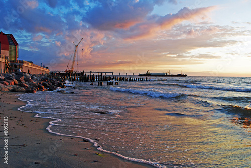 Sunset on the Baltic Sea shore photo