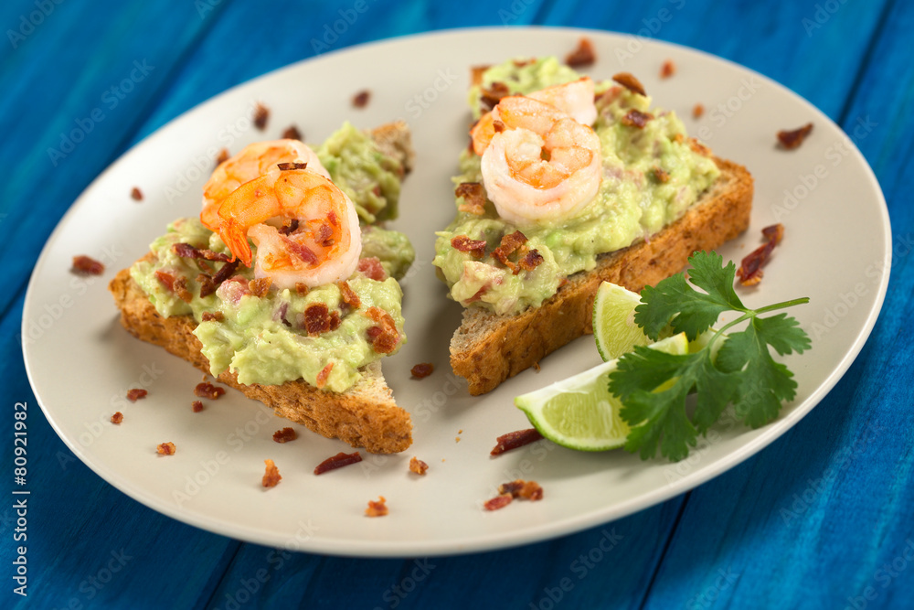 Toast bread with guacamole, fried shrimp, fried bacon Toast bread with guacamole, fried shrimp, fried bacon