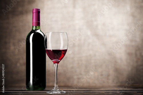 Wine Bottle. Red wine bottle and glass, isolated on white