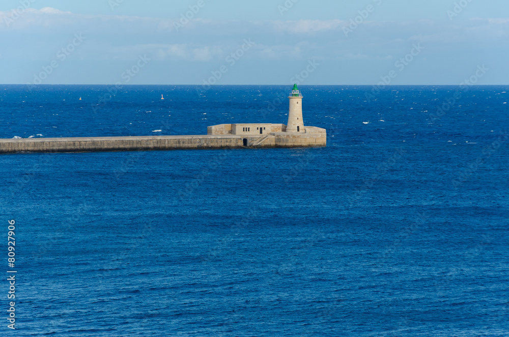 Valletta,MALTA -CIRCA OCTOBER, 2015- lighthouse in Grand Harbour Valletta,MALTA -CIRCA OCTOBER, 2015- lighthouse in Grand Harbour