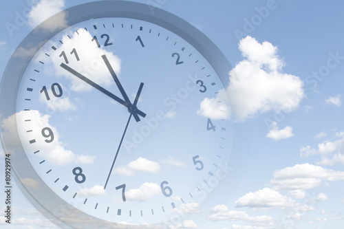 Clock in sky. Time passing