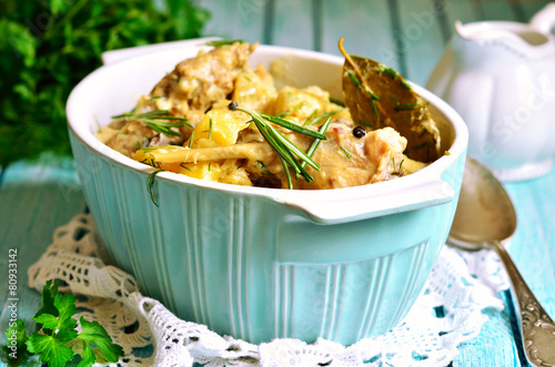 Rabbit stewed with potato in a cream sauce.