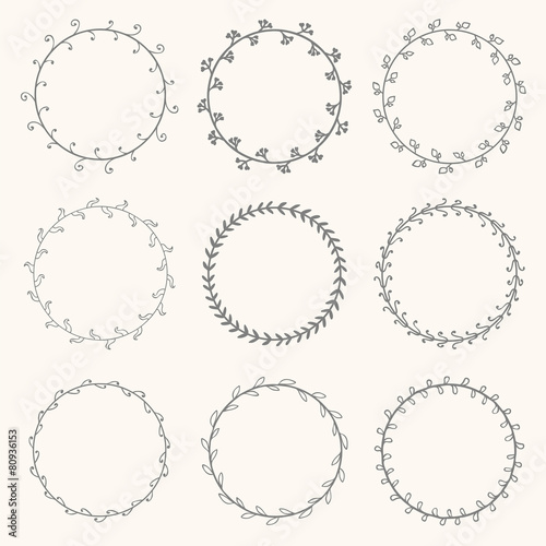 Collection of hand drawn vector round wreaths. Decorative elemen